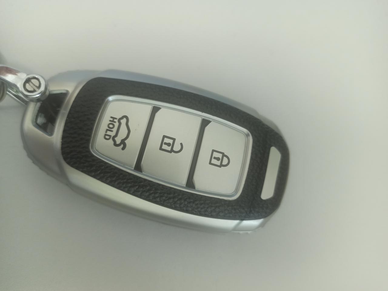 现代ix35 车钥匙最下边的按钮是做啥用的？