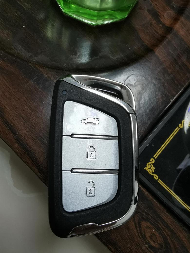 嘉悦a5 超越型后背箱用钥匙能不能自动打开，我的钥匙上面显示是可以开的，为什么我打不开