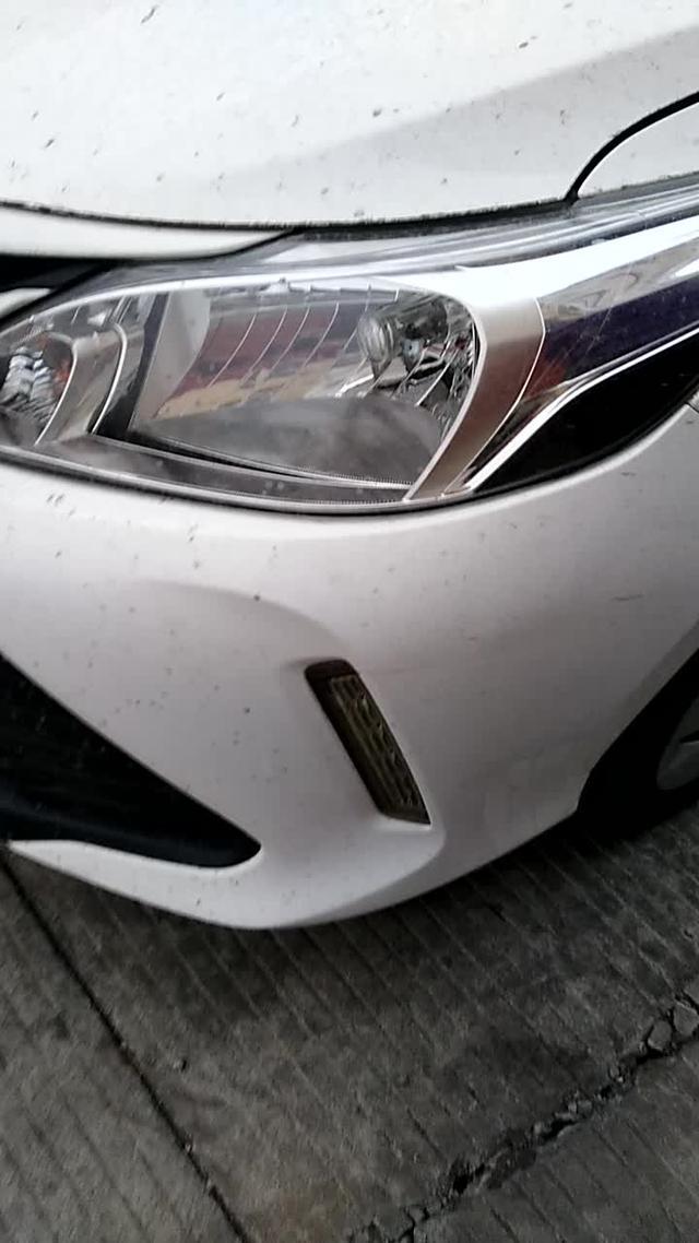 大家看一下，这是丰田威驰车的小雾灯，它不是原车的后换的漂不漂亮？
