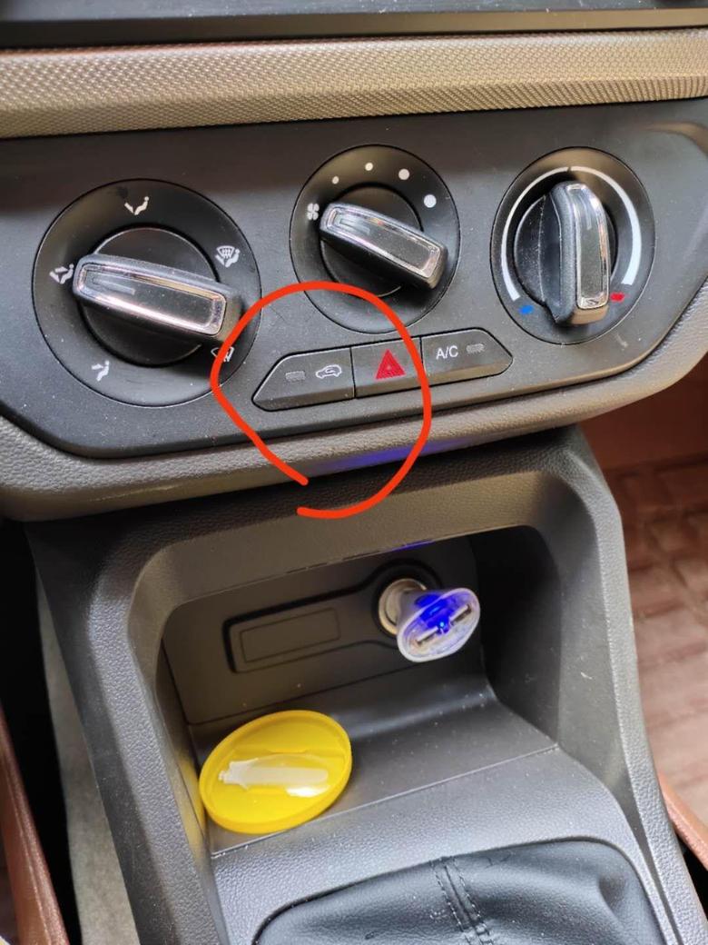 五菱宏光那个小汽车标志的按键起什么作用？？