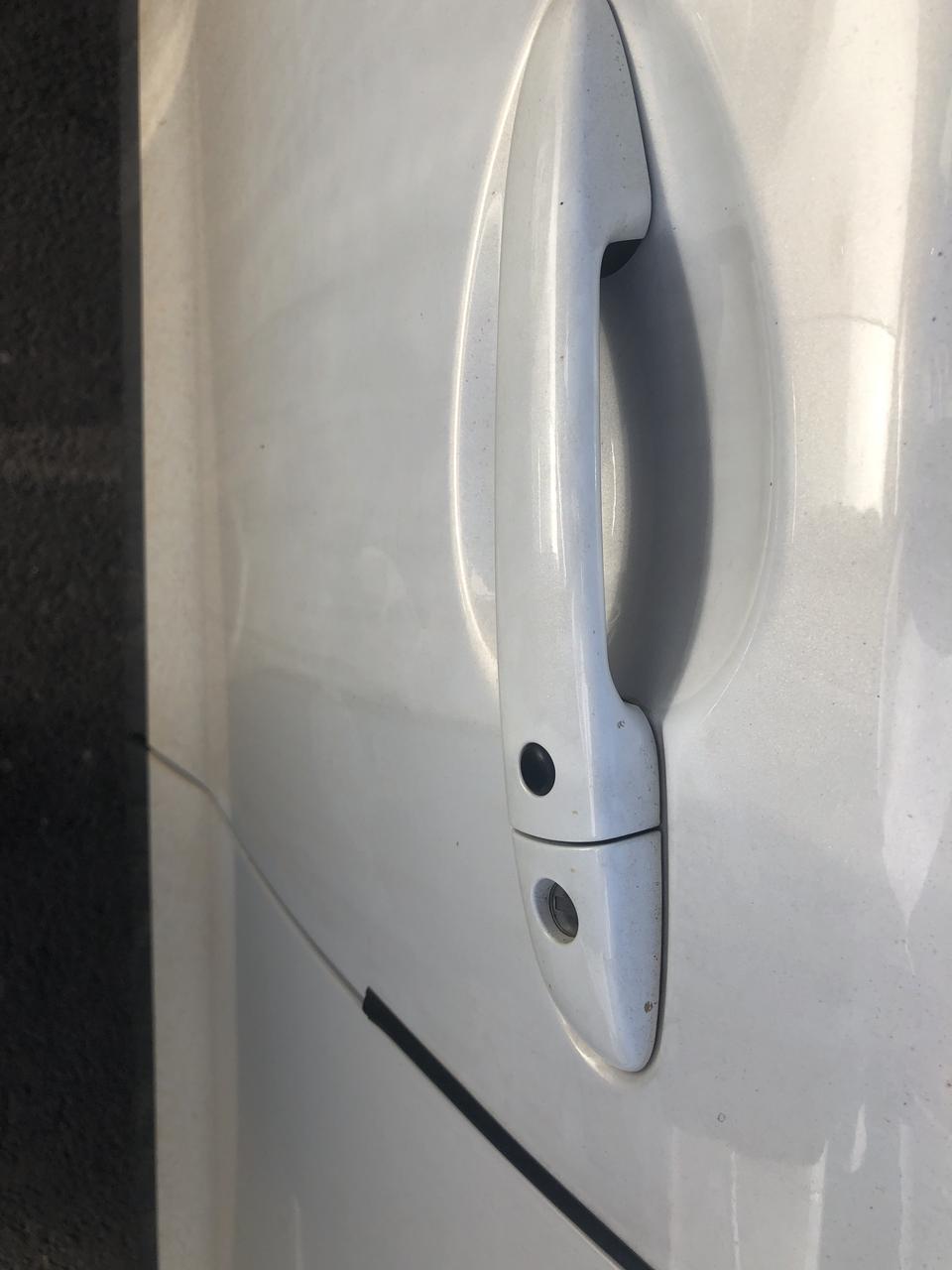 马自达cx4 下车给车辆上锁时，按车门上的无钥匙进入键，会发出连续的滴滴声，怎么回事？