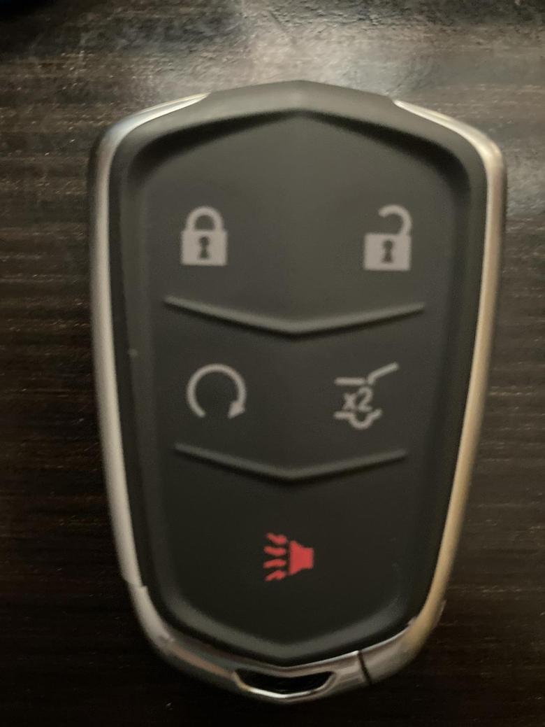凯迪拉克xt5 钥匙上的第二排第一个远程启动按钮按了没反应新车有老哥懂吗