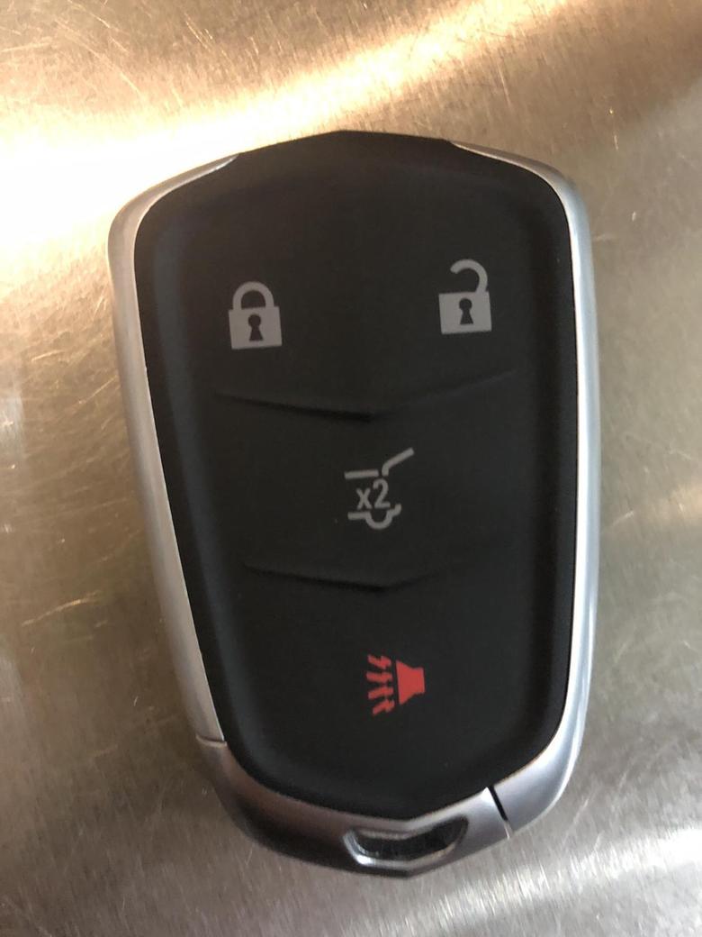 凯迪拉克xt4 请问大家这个遥控钥匙怎么远程启动车辆和开启车窗啊？