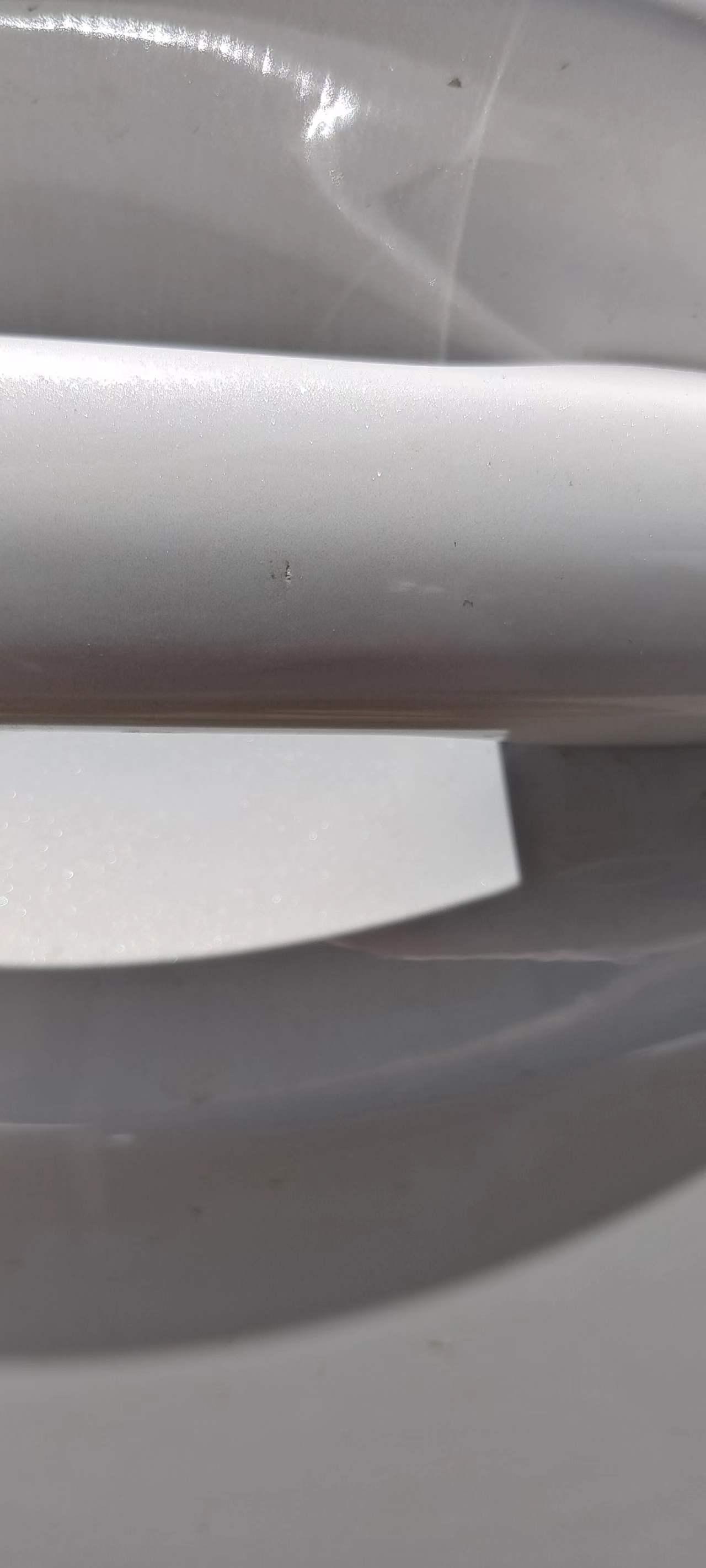 马自达阿特兹 车门把手有个坑印，洗车之后坑印旁边的保护膜（车自带的保护膜）掉了，对漆有影响吗